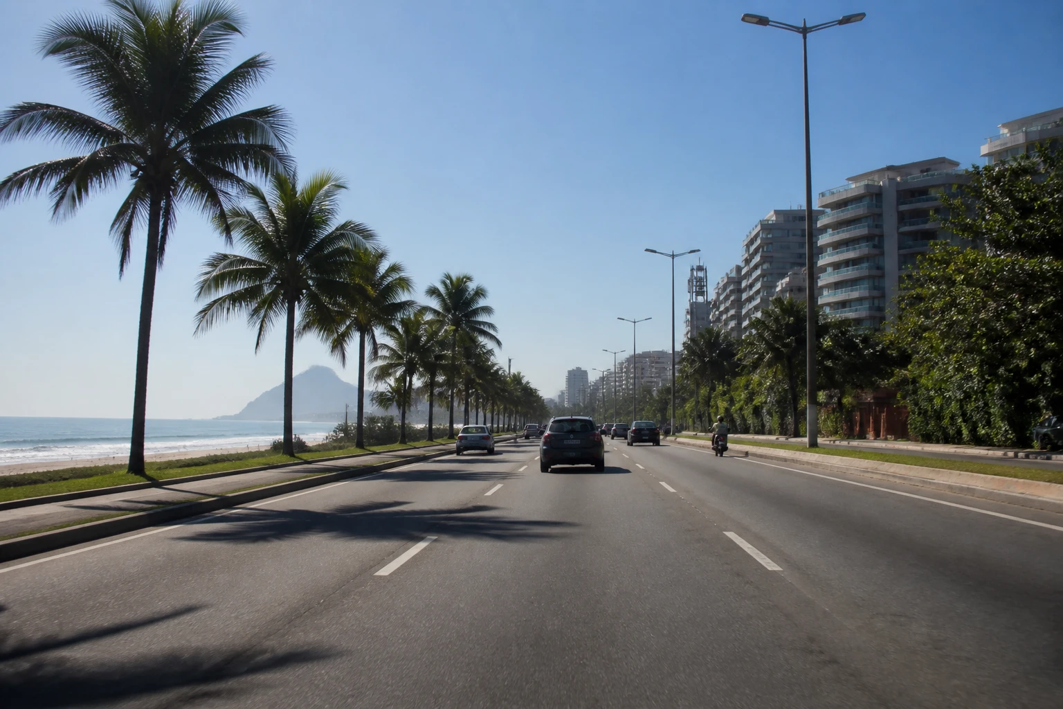 Vehicle traveling along the beachfront in Barra da Tijuca