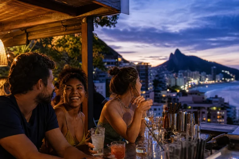 Friends enjoying an evening at an open-air bar in Rio de Janeiro