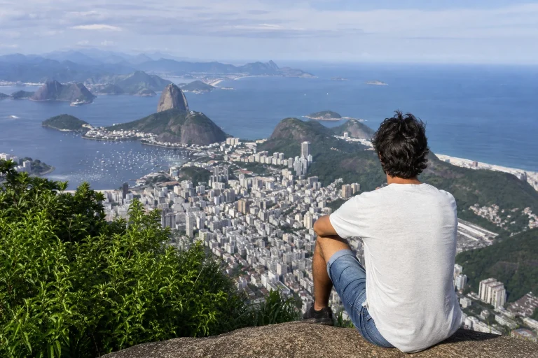 Solo traveler looking across Rio de Janeiro during the day