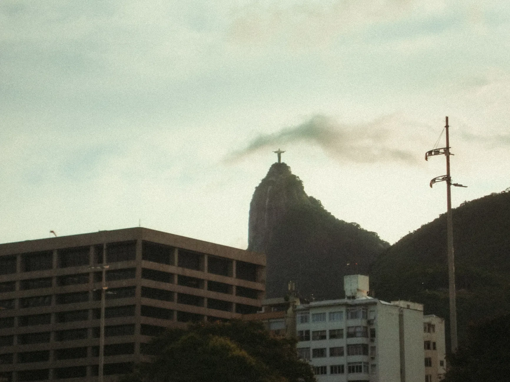 Christ the Redeemer statue viewed from the Alto Corcovado platform in Rio de Janeiro