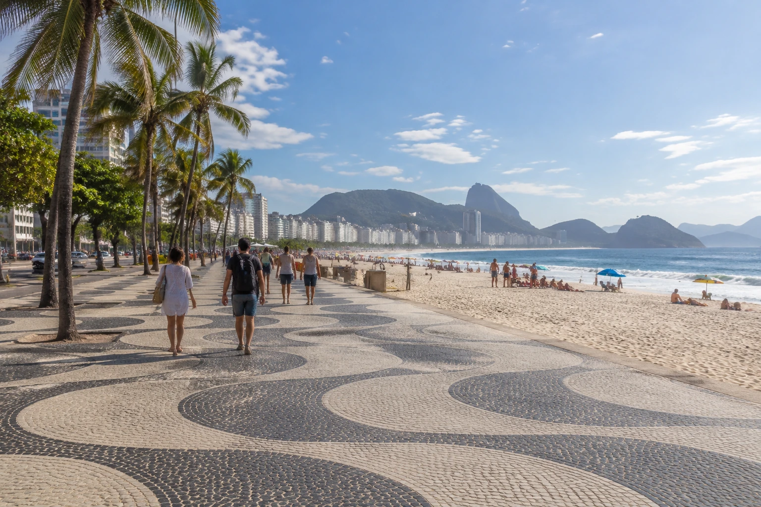 Pedestrians walking along the Copacabana Beach promenade